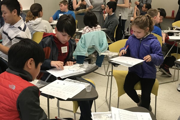 kids doing science in a donnelly centre seminar room