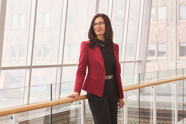 Milica Radisic standing inside glass building
