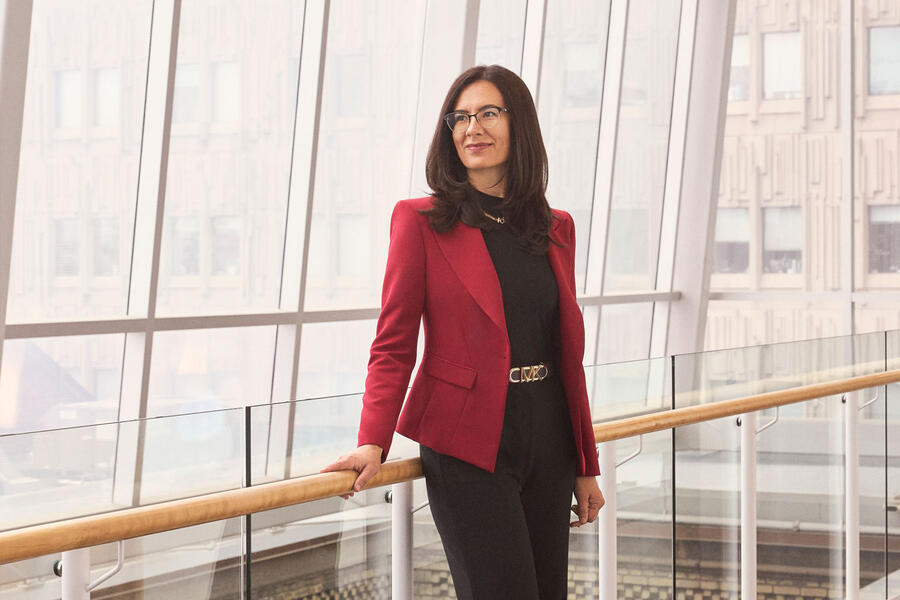 Milica Radisic standing inside glass building