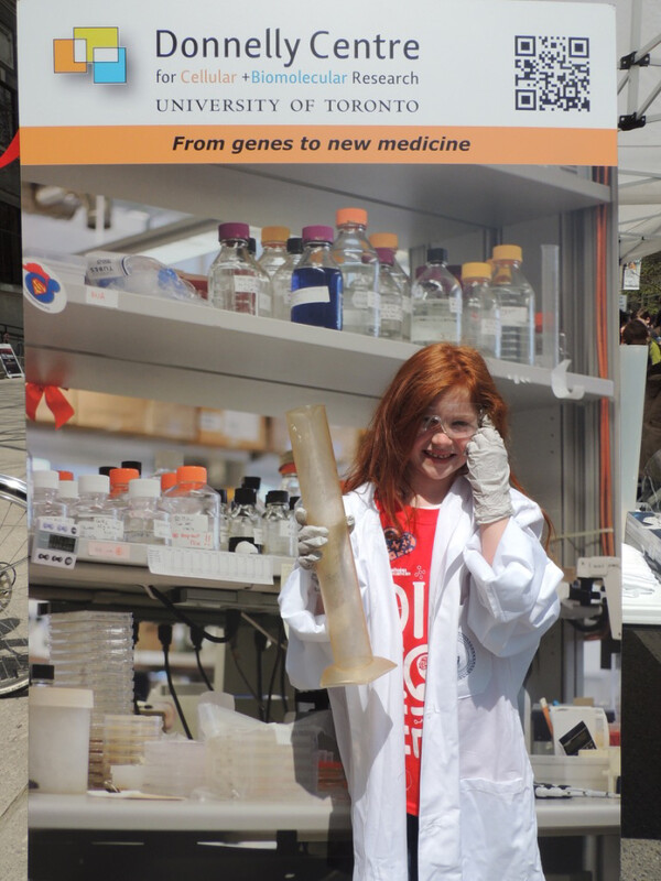 girl posing as scientist