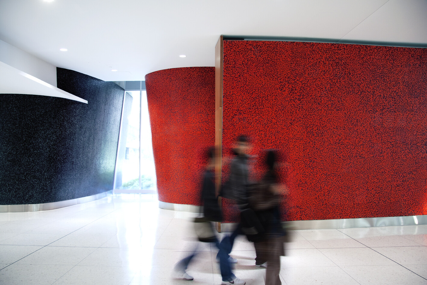 students walking thourgh Donnelly Centre building